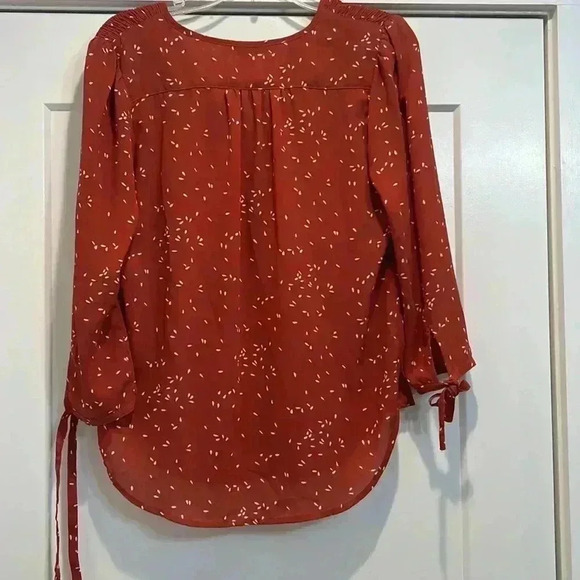 Fun2fun rust colored shirt with a cream colored design size small. - Picture 10 of 11